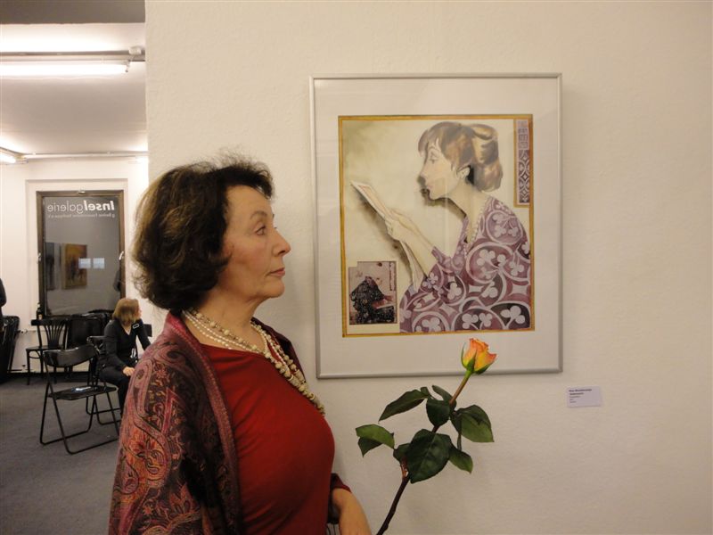 Exhibition opening, painter and her picture